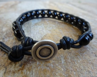 Men's 8mm Black Onyx Gemstone Single Wrap Beaded Bracelet With Black Leather and a Silver Metal Shield Button