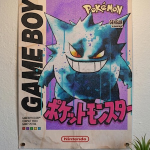 May include: A retro poster of the Pok&eacute;mon Gengar, with a purple and blue colour scheme. The poster includes the text "GAME BOY" and "Pok&eacute;mon" in bold fonts, along with the Japanese text "ポケットモンスター". The poster is mounted on a wall.