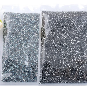 2-6mm DMC Hot Melt Adhesivo Hot Fix Rhinestone BRICOLAJE Ropa Decoración Rhinestone Glass Crystal Jewelry Accesorios al por mayor