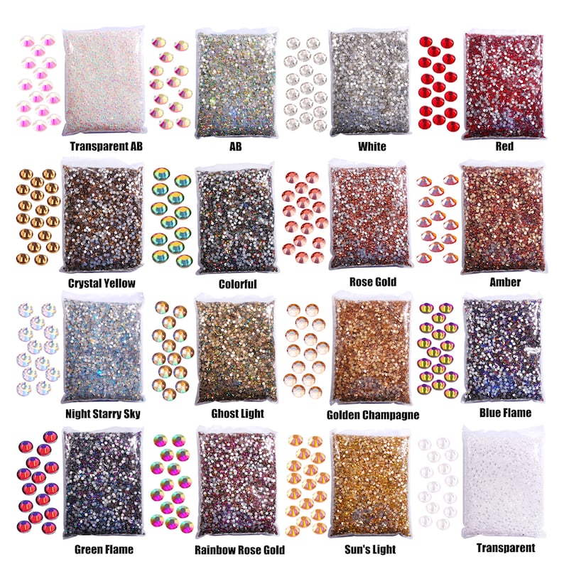 May include: Assortment of 16 bags of colorful rhinestones, each bag labeled with a different color name, such as "Transparent AB", "AB", "White", "Red", "Crystal Yellow", "Colorful", "Rose Gold", "Amber", "Night Starry Sky", "Ghost Light", "Golden Champagne", "Blue Flame", "Green Flame", "Rainbow Rose Gold", "Sun's Light", and "Transparent".