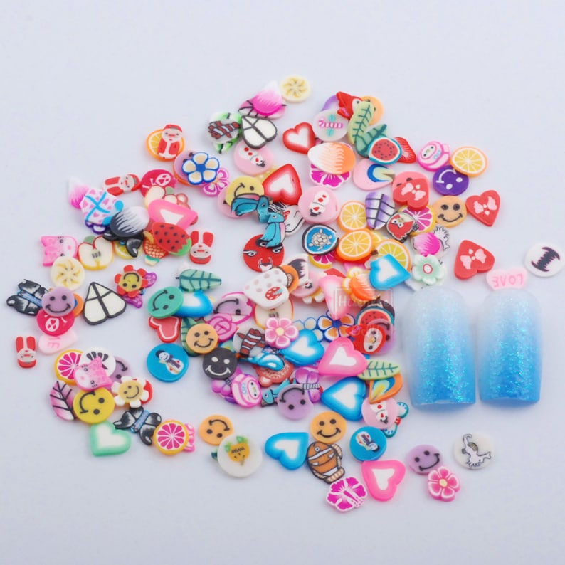 2000pcs/pack Nail Art 3D Fruit Feather Heart Flower Candy Animal dessert Mixed Designs Tiny Fimo Slices Polymer Clay Nail Sticker Decoration image 3