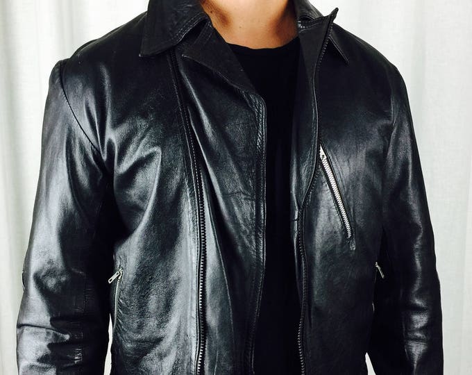 Vintage Late 60's 70's unisex black leather motorcycle jacket