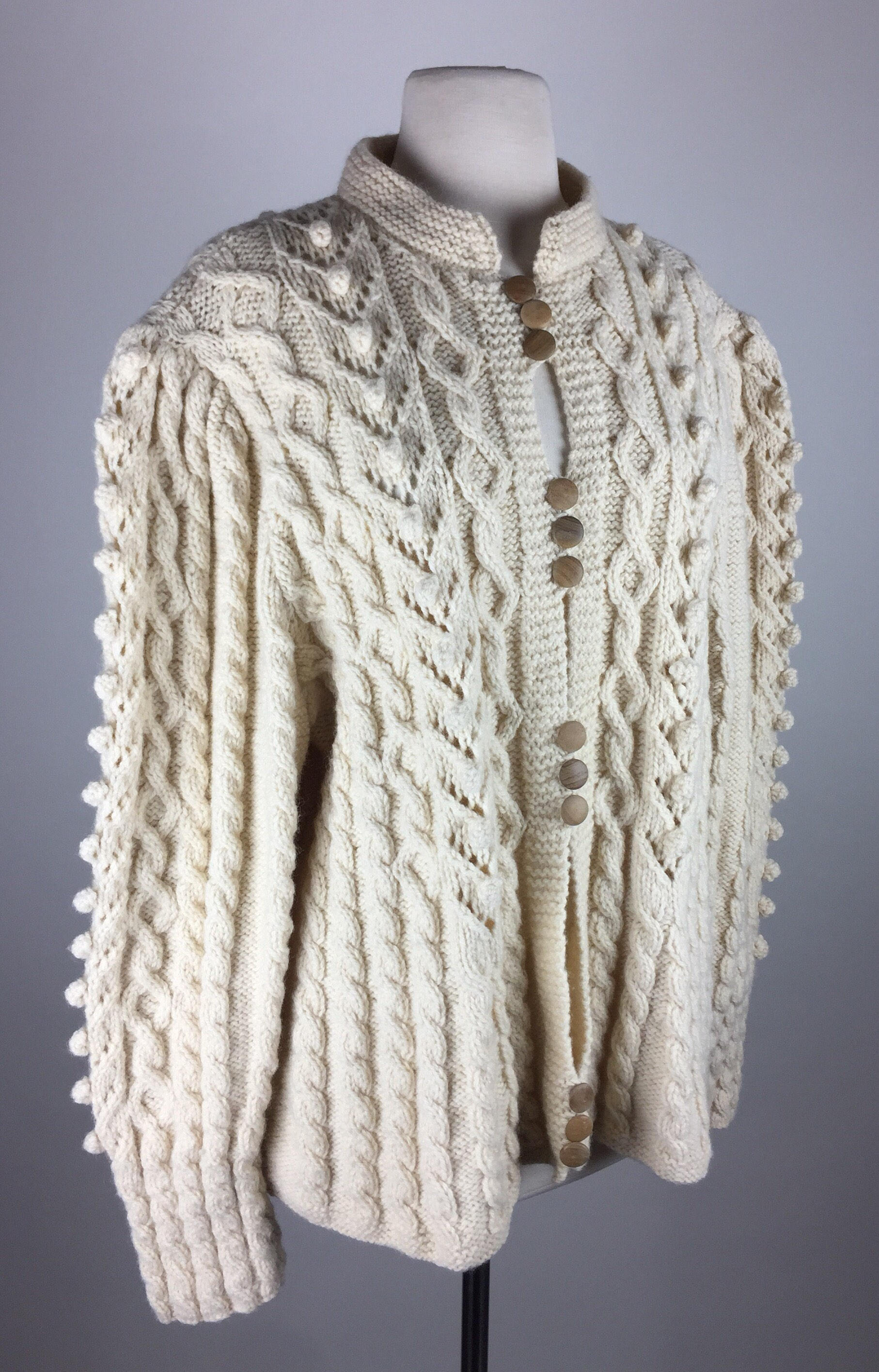 cream colored cardigan sweater