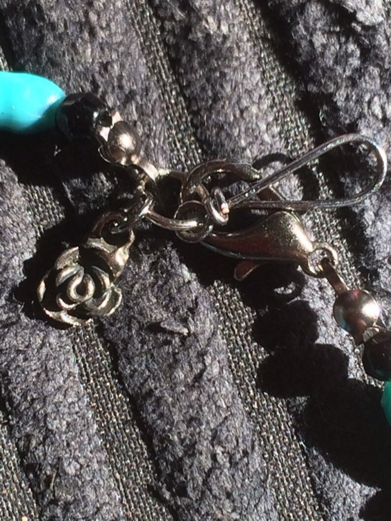 Turquoise and black graduated bead bracelet