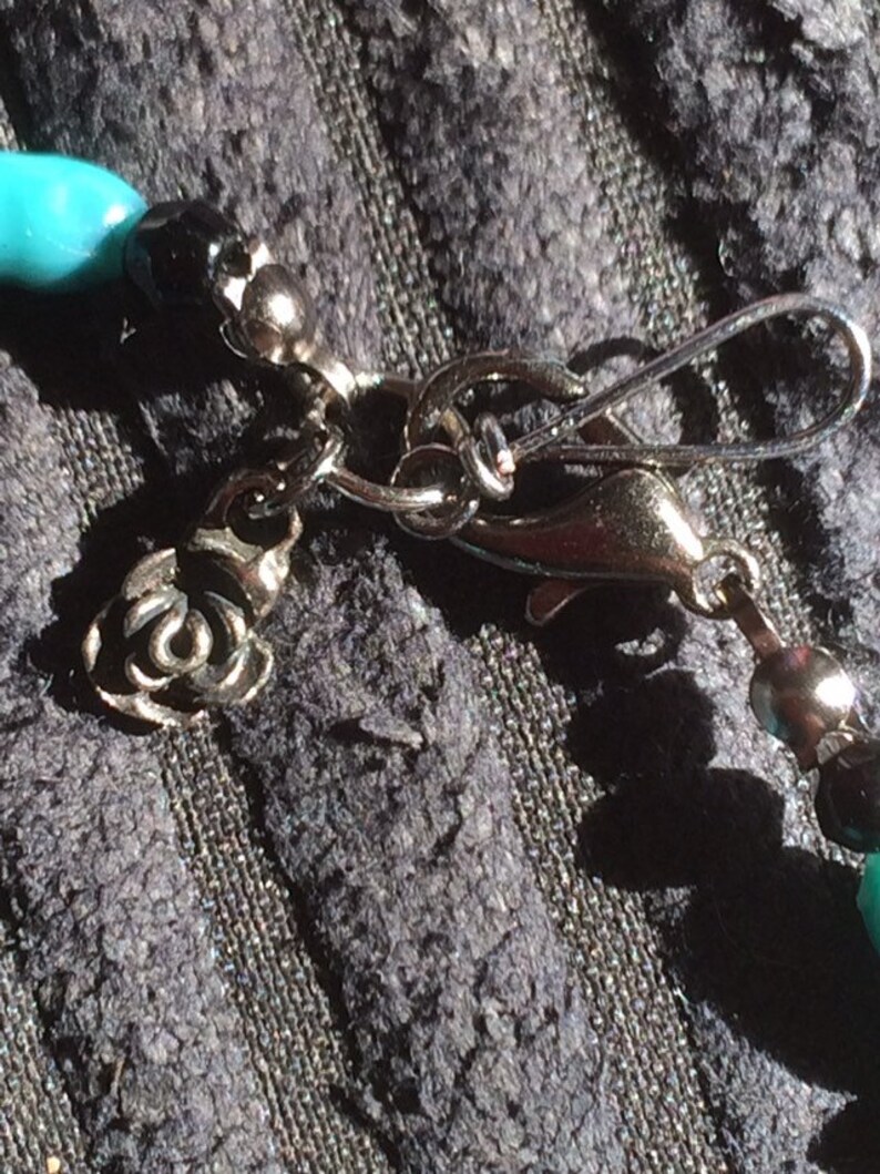 Turquoise and black graduated bead bracelet