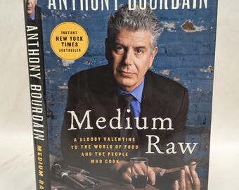 Medium Raw, by Anthony Bourdain. First Edition, Eighth Printing, 2010, Ecco, NY.