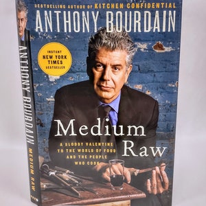 Signed - Medium Raw, by Anthony Bourdain. First Edition, Fifth Printing, Ecco, 2010.