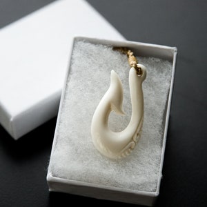 Hook Bone Pendant with Polynesian Designs