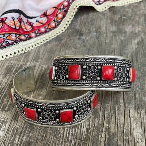 Bracelet with coral in boho style, heaps of tribal jewelry, Tuareg cuff, Kazakh ethnic amulet.