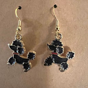 Poodle earrings (available in black, blue, light pink, red, and white)