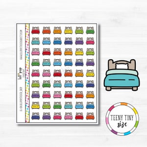 May include: Sheet of colourful bed stickers in various colours, including red, orange, yellow, green, blue, purple, and pink. Each sticker features a bed with a headboard, blanket, and pillow. The stickers are labelled "Teeny Tiny Size" and include the shop's Instagram and website.