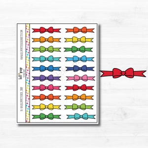 May include: A sheet of rainbow coloured bow stickers with a single red bow sticker on a white background. The stickers are for decorating planners, journals, and other paper crafts.