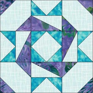 Könnte beinhalten: Ein Quiltblock mit geometrischem Design, das eine zentrale Diamantform zeigt, die von Dreiecken in Blautönen, Lila und Weiß umgeben ist.