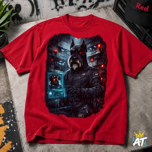 May include: A bright red short-sleeve t-shirt featuring a graphic print of a black dog dressed in tactical gear. The dog has a glowing red eye and is positioned in a dark, industrial setting with red lights. A small digital screen shows a dog.