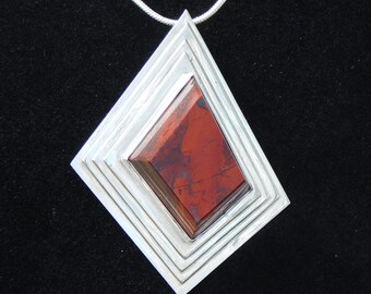 Unique Sterling Silver Free Form Pendant with a Cuprite Cabochon