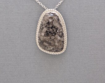 Unique Sterling Silver Free Form Pendant with a Crinoid Agate Cabochon