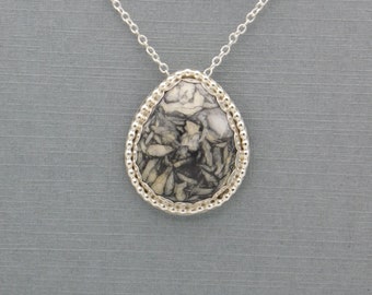 Unique Hand Crafted Sterling Silver Pendant With A Pinolite Cabochon