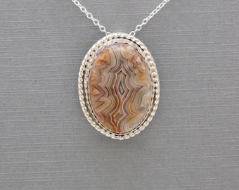 Unique Hand Crafted Sterling Silver Pendant With A Laguna Agate Cabochon