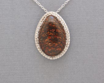 Unique Sterling Silver Tear Drop Pendant with a Agatized Dinosaur Bone Cabochon