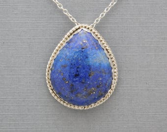 Unique Hand-Crafted Teardrop Sterling Silver Pendant with a Lapis Cabochon