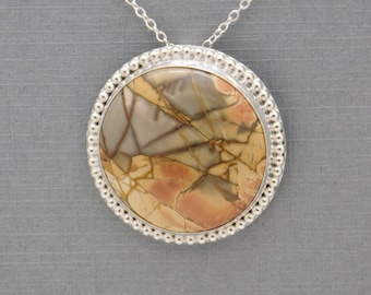 Unique Hand-Crafted Sterling Silver Pendant With A Cherry Creek Jasper Cabochon