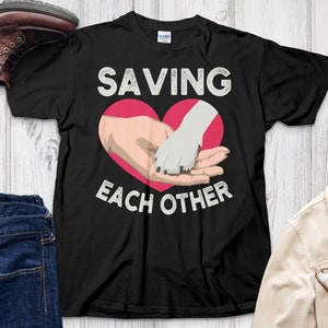 Saving Each Other Graphic Tee, Dog Lover Shirt, Animal Rescue T-Shirt, Heart and Paw Print Design, Unisex Casual Top