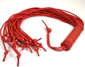 Paracord flogger with soft grip rubber handle in Red. 26 falls 20 inches long. Knotted at ends
