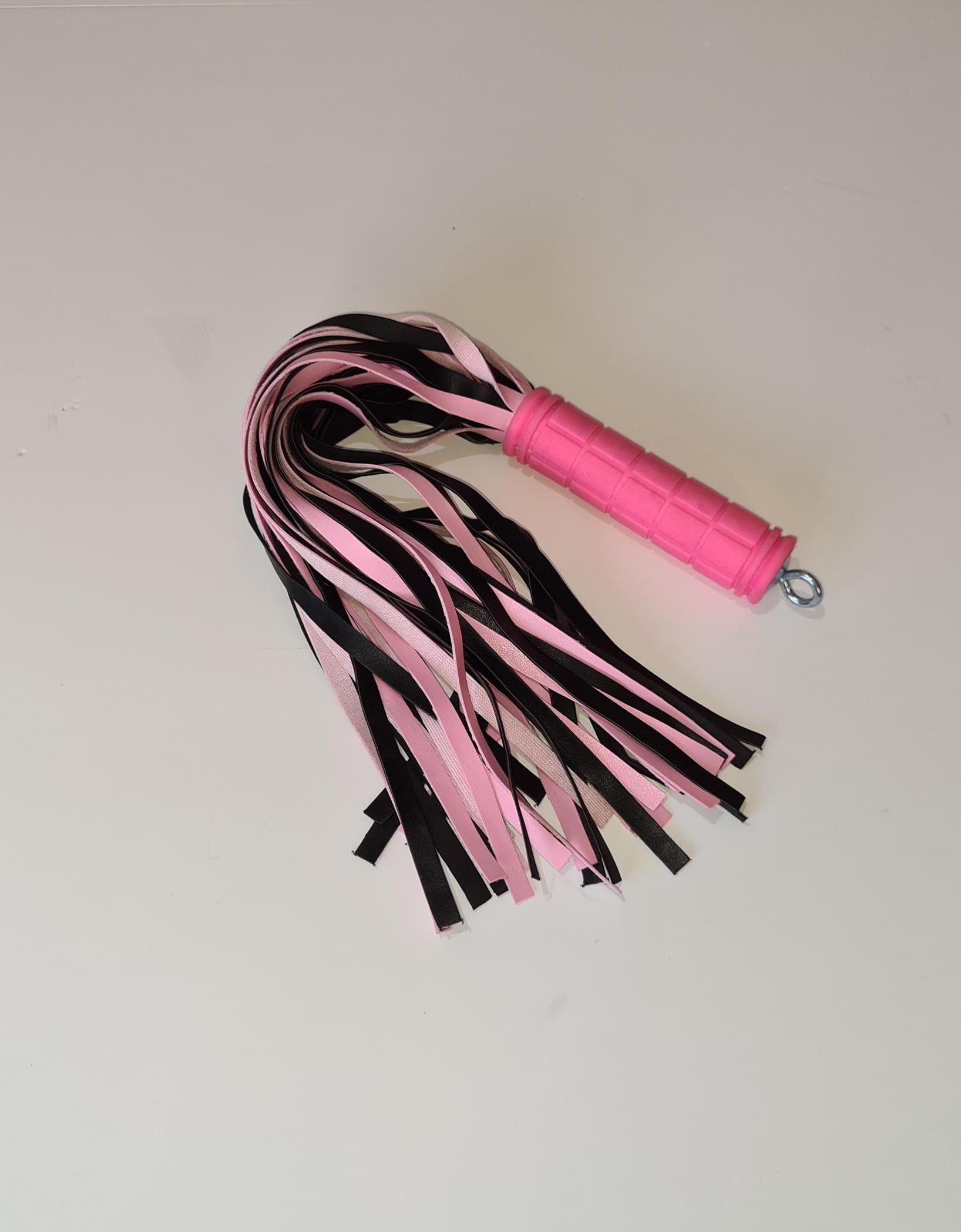 Vegan-leather flogger, PINK & BLACK  Approx 40 falls x 14 long, soft rubber handle