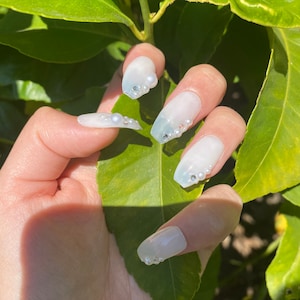 Press on nails | gel press ons | hand printed nails | white nails | fake nails | pearl nails
