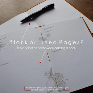 May include: Open recipe book with blank or lined pages, a black pen, and botanical illustrations. The text reads "Blank or Lined Pages? Please select an option when ordering a book." The paper is described as high quality, whitest, thickest (120 gsm) acid-free.