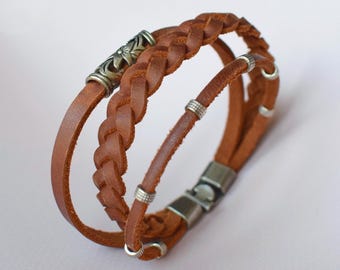 Braided leather bracelet with metal beads
