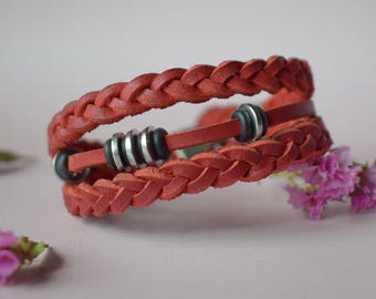 Braided leather bracelet with metal beads