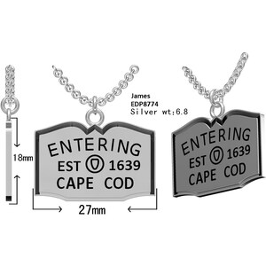 May include: Silver necklace with a pendant shaped like a vintage road sign that reads "Entering Est 1639 Cape Cod". The pendant is 2.7 inches wide and 1.8 inches tall.