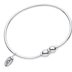 May include: A silver bangle bracelet with two round beads and a small oval charm. The charm has the text "CAPE COD JEWELRY" and a medical symbol. The bracelet is a simple, elegant design.