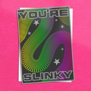 May include: Greeting card with a black background featuring a colourful slinky design in yellow, green, and purple. The text "YOU'RE SLINKY" is in a silver, outlined font, with white stars scattered around the slinky design.