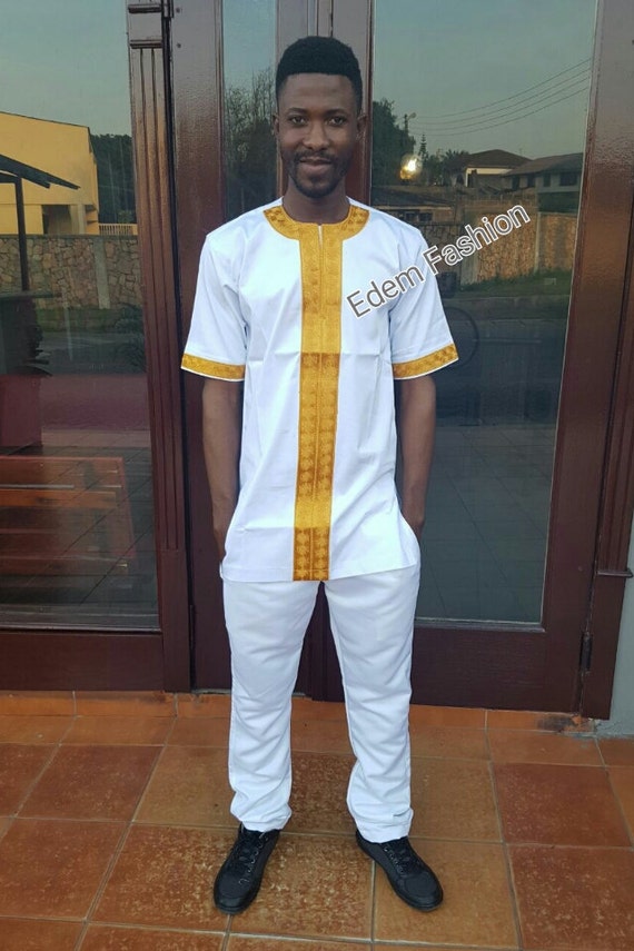 white and gold african shirt