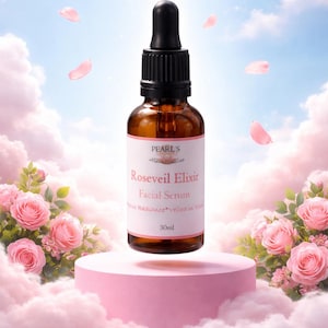 May include: A brown glass bottle of Roseveil Elixir Facial Serum with a black dropper. The label is white with pink accents and text. The bottle is on a pink pedestal, surrounded by pink roses and floating pink petals.