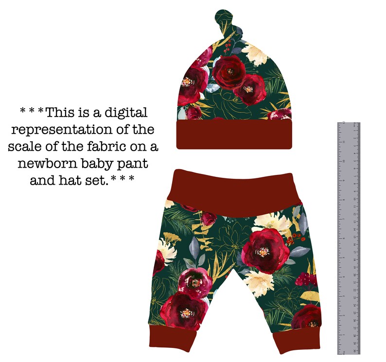 May include: A newborn baby hat and pants set with a burgundy red and green floral print. The hat has a knot on top and the pants have a burgundy red waistband.