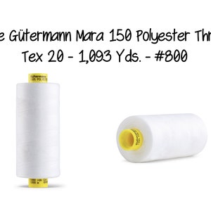 May include: White Gütermann Mara 150 Polyester Thread, Tex 20 - 1,093 Yds. - #800. A spool of white thread with a yellow label.
