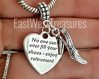 May include: Silver charm bracelet with a heart-shaped charm that reads "No one can ever fill your shoes - enjoy retirement" and a silver high heel shoe charm.