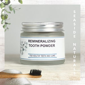 Remineralizing Tooth Powder in glass jar, vegan natural toothpaste
