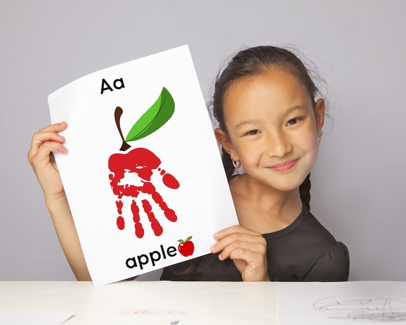 scrapbook-style handprint alphabet book
embossed handprint alphabet book
pop-up handprint alphabet book
stitched handprint alphabet book
fabric handprint alphabet book
wooden handprint alphabet book