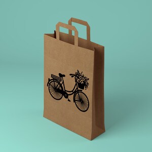 May include: A brown paper shopping bag with a black silhouette of a bicycle with a basket of flowers on the front.