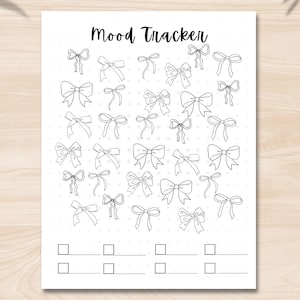 May include: A printable mood tracker with a white background and black outlines of bows. The text "Mood Tracker" is at the top of the page. There are 30 bows in total, and below the bows are 6 blank lines with checkboxes.