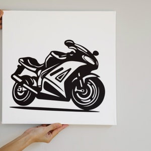 May include: Black and white illustration of a motorcycle on a white background.