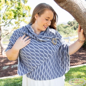 May include: A white ceramic mug with a black handle and the text "But First, Coffee" in a black, handwritten-style font. The mug is on a white surface.