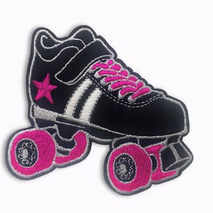 May include: Black and pink roller skate with white stripes and a pink star on the side. The skate has pink wheels and a black strap.