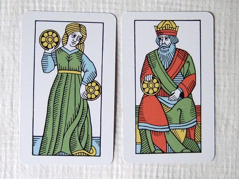Great Parade tarot, greener edition, female jack and king of coins.
