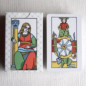 O Tarô da Grande Parada, com iconografia histórica italiana, semelhante ao Tarô de Marselha.