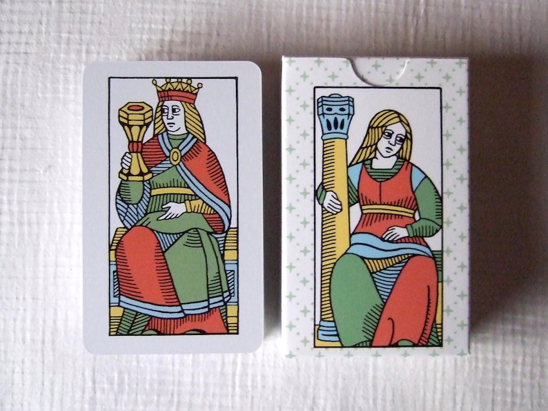 The Great Parade tarot, greener edition, queen of cups and tuck box.